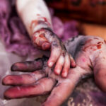 Bloody Hands of Child and Adult – created from fake blood.